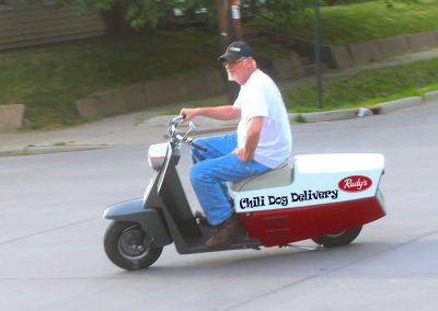 Man riding Rudy's Scooter