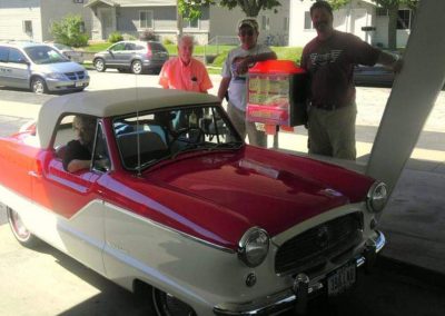 Vintage red and white car at rootbeer stand